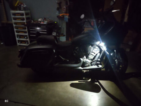 The Electrical Connection Puddle Light Kit mounts to the fairing to illuminate all of the ground and bike.