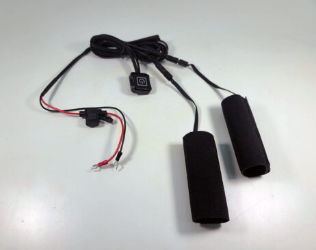 The 04304 Passenger heated grip kit contains a waterproof controller, 2 removable grip heaters, and a full wiring harness with fuse.